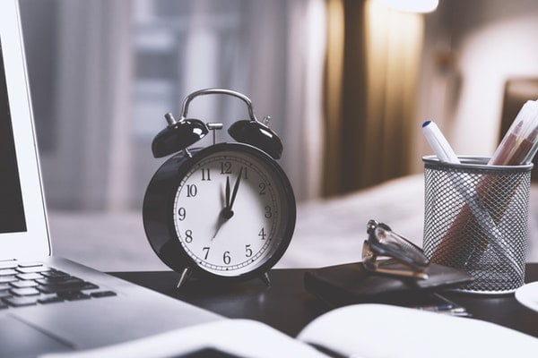 extra hour a day clock at desk